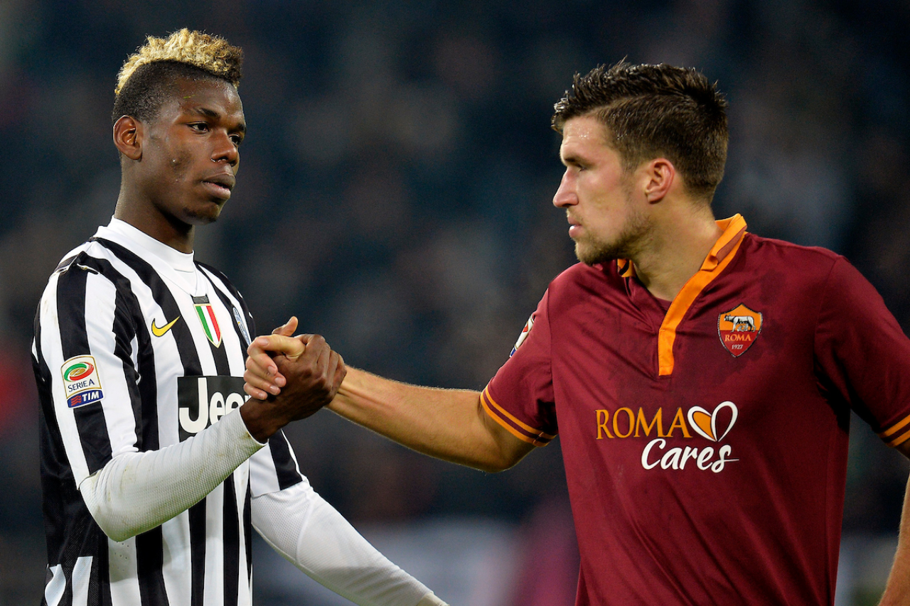 Paul Pogba e Kevin Strootman durante Juventus-Roma del 5 gennaio 2014 (Foto Andrea Staccioli / Insidefoto)